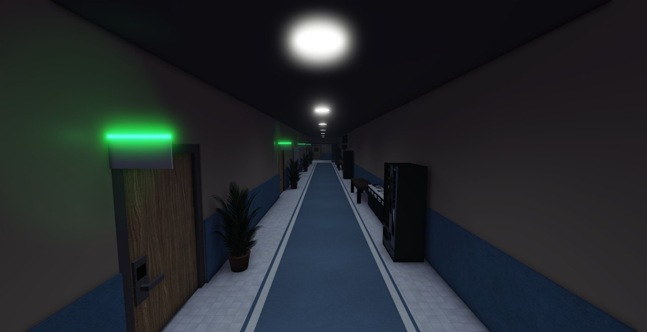 A long hotel hallway with numbered room doors.